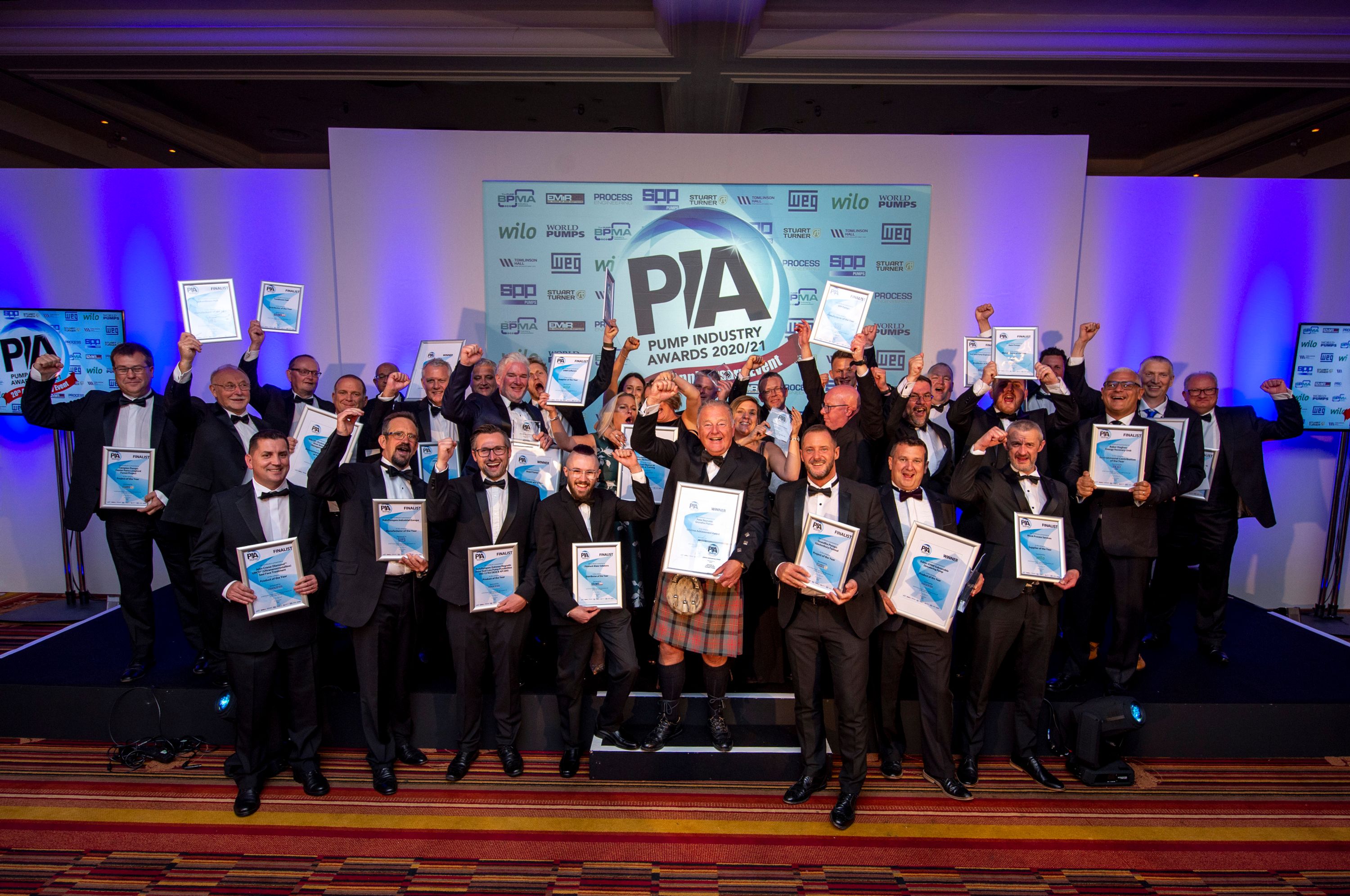 Winners from PIA Awards holding their certificates